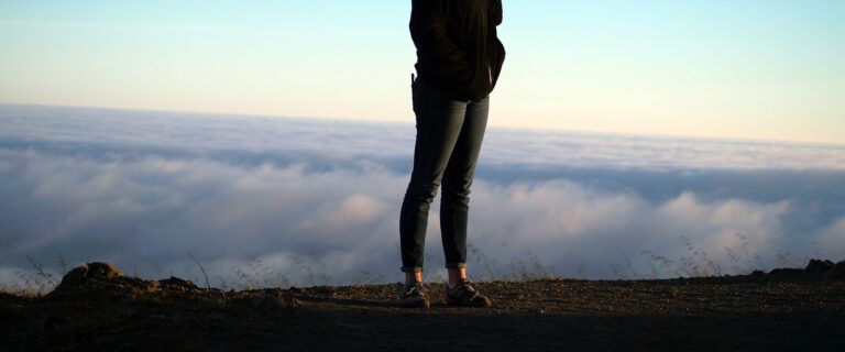 Standing alone.